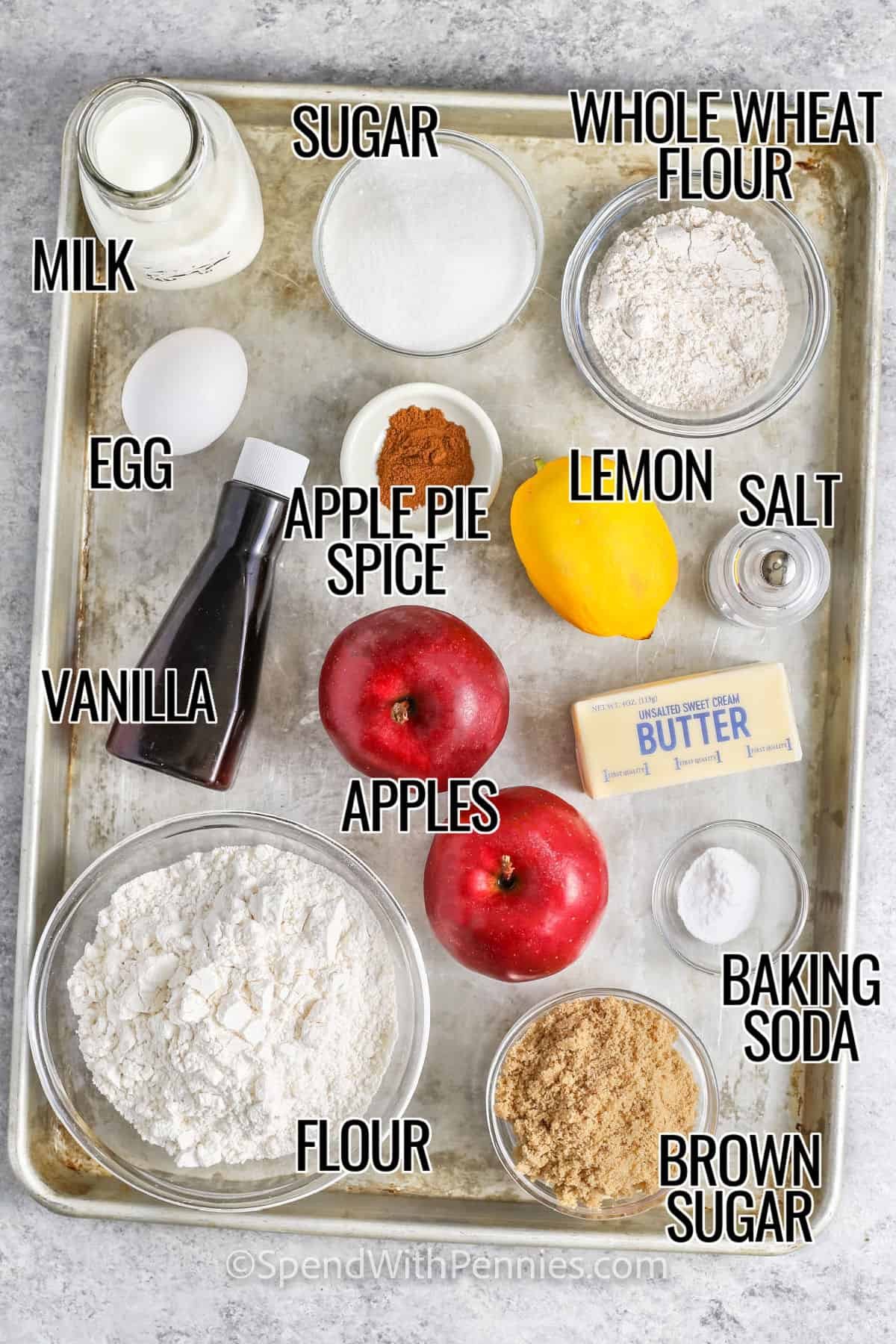 milk , sugar , flour , lemon , salt , apple pie spice , egg , vanilla , apples , baking soda , and brown sugar with labels to make Apple Muffins