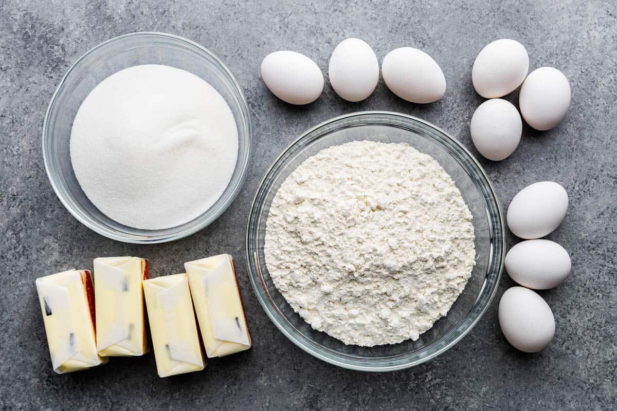 pound cake ingredients in bowls on kitchen counter