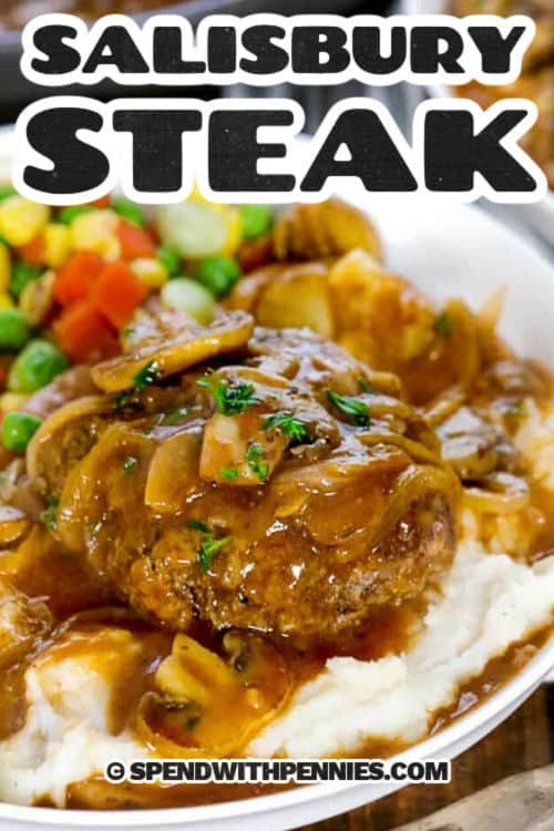 mushroom salisbury steak served over mashed potatoes with veggies with text