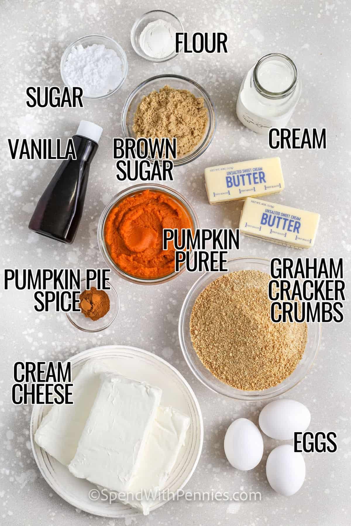 flour , sugar , cream , brown sugar , vanilla , pumpkin puree , butter , graham cracker crumbs , pumpkin pie spice , cream cheese and eggs with labels to make Pumpkin Cheesecake Bars