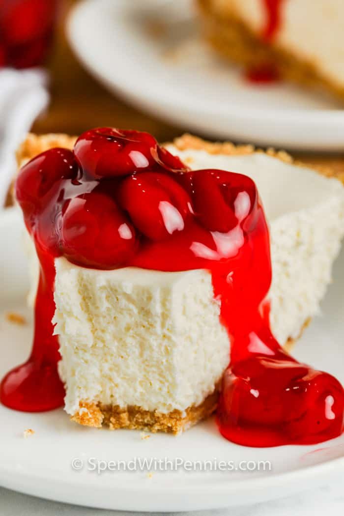 close up of a slice of No Bake Cheesecake with a bite out of it