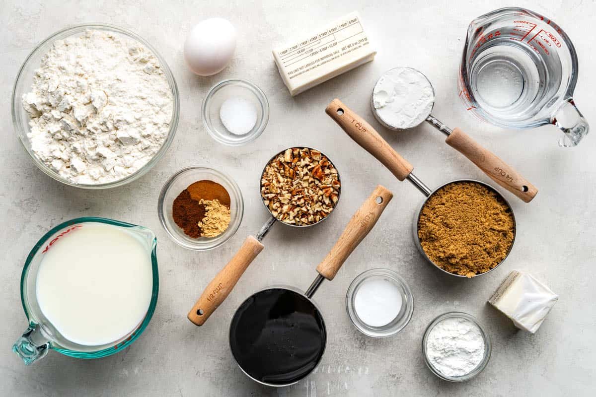 raw ingredients needed to make gingerbread pancakes with butter pecan syrup on table